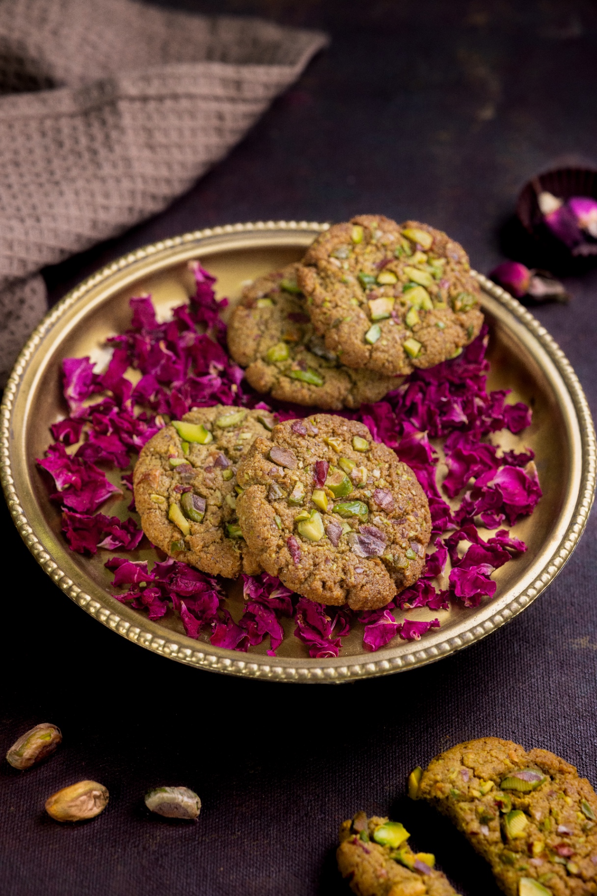 Pistachio cookies on brass plate